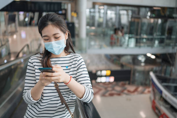 istock New normal routine going outside with facemask protect pm 2.5 and covid-19 travel at discount store and mall 1307170294
