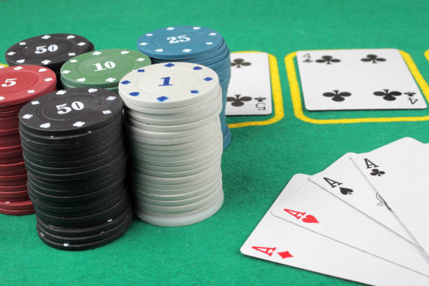 istock poker card game, winning combination four aces, selective focus. 1307178465
