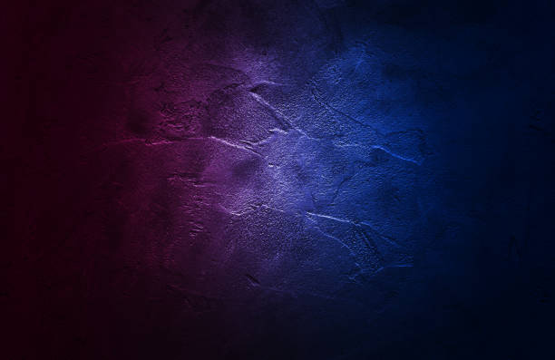 istock Neon scene empty with smoke and spotlight on  wall. Rays neon light in the dark with  smoke. 1307183938