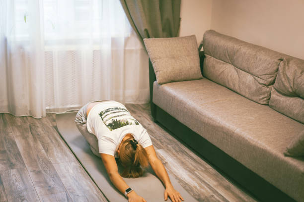 istock Woman doing yoga 1307184633