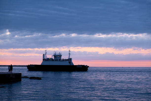 Bay with passing ships in Sevastopol, Crimea at sunset