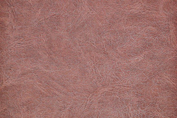 istock Texture of brown artificial leather. Imitation leather, Leatherette 1307187180