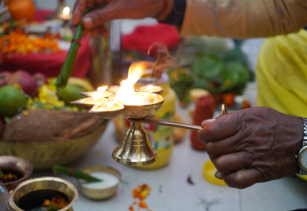 istock oil brass lamp lit for worship in puja-arati 1307189026