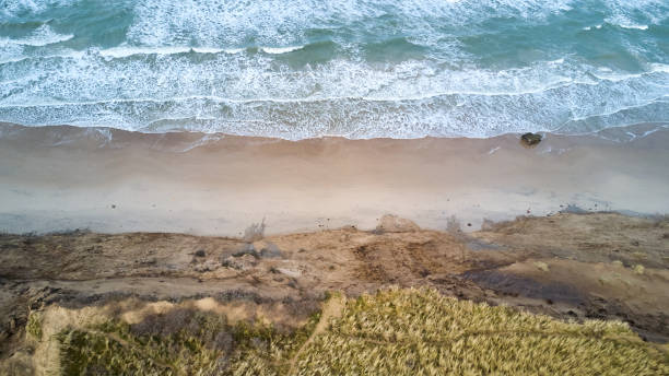 istock view of the ocean waves and sandy beach 1307190422