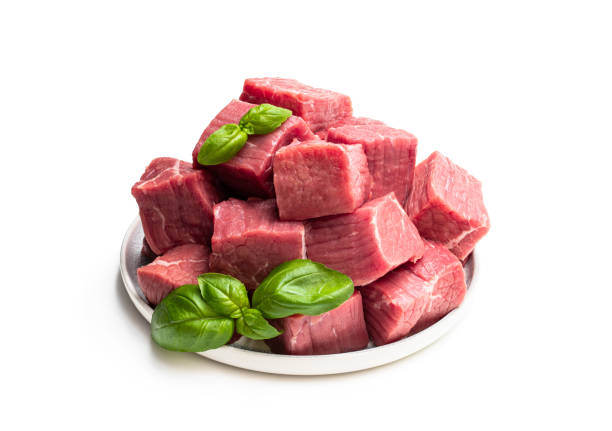 istock Fresh raw beef in ceramic plate isolated on white 1307192856