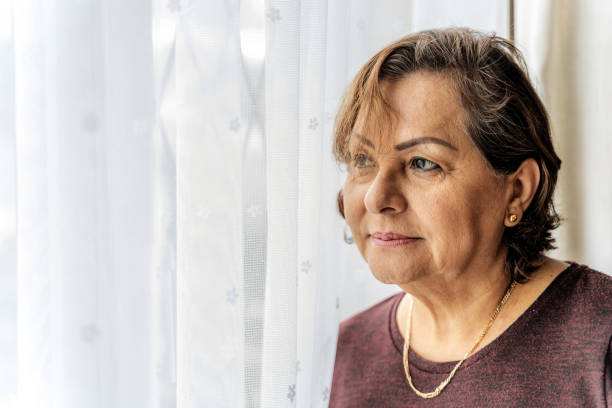 istock Senior Hispanic woman headshot 1307193950