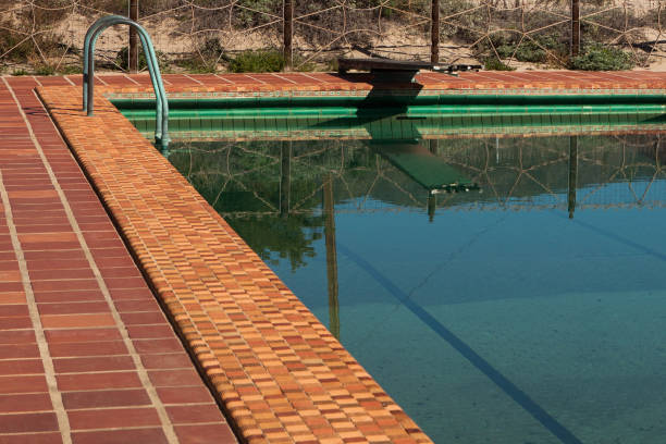 istock Swimming pool with a diving board 1307195742