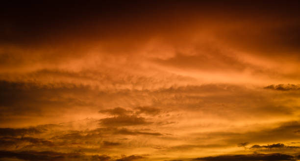 istock Altostratus clouds in golden sunset. Evening Cloudscape. 1307197280