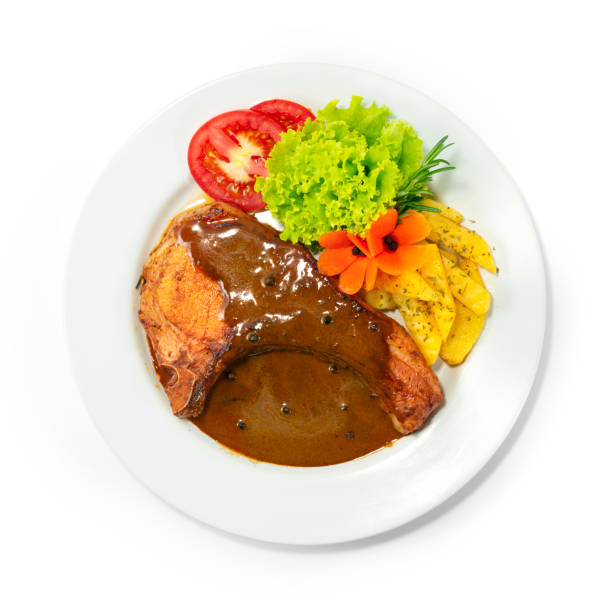 istock Grilled Pork Chops with Gravy Sauce 1307199561