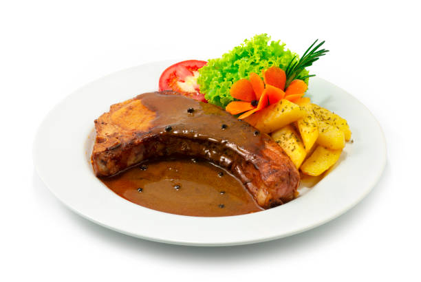 istock Grilled Pork Chops with Gravy Sauce 1307199564