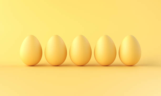 istock A row of eggs eggs on yellow background. 3d rendering 1307199842