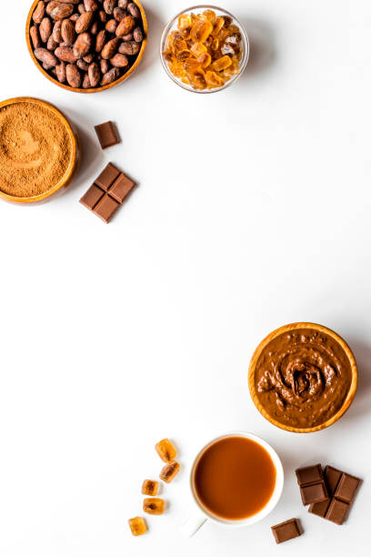 istock Coffee and cocoa beans and powder. Chocolate and coffee background 1307202922