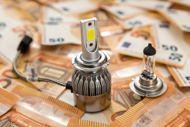 istock modern car bulbs on 50 euro bills 1307209358