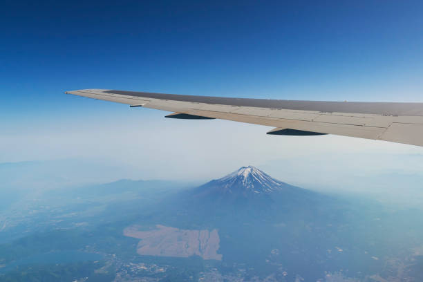 istock Commercial flight over Fuji mountain with fantastic window view 1307211465