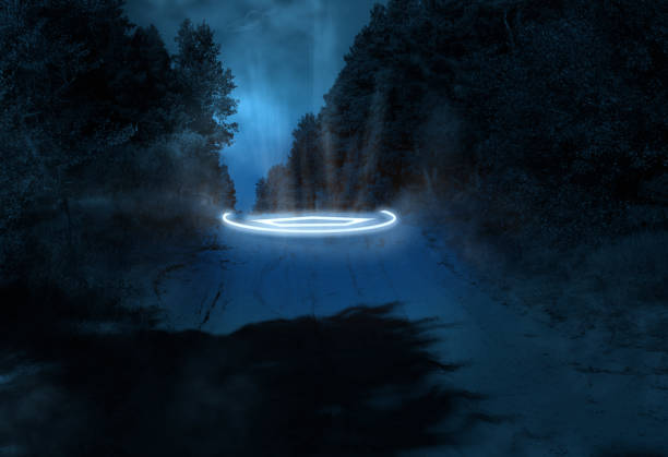 istock road in the forest at night with glowing neon elements, pine trees on the sides 1307211585
