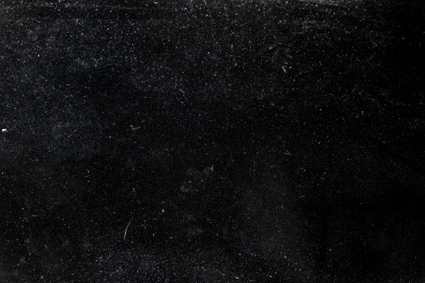 istock White dust on the black surface of the object. 1307211631