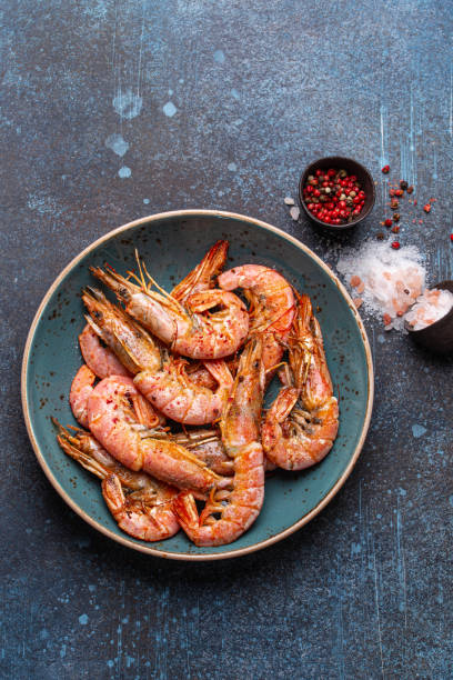 istock Whole cooked shrimps in bowl 1307212280