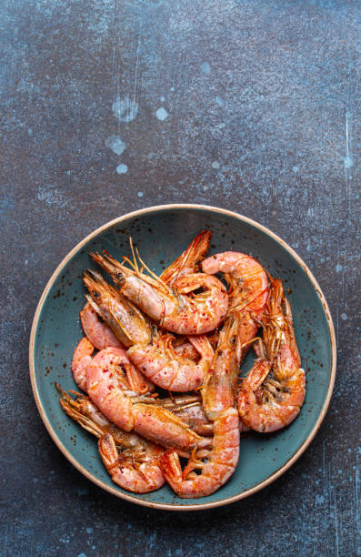 istock Whole cooked shrimps in bowl 1307212290