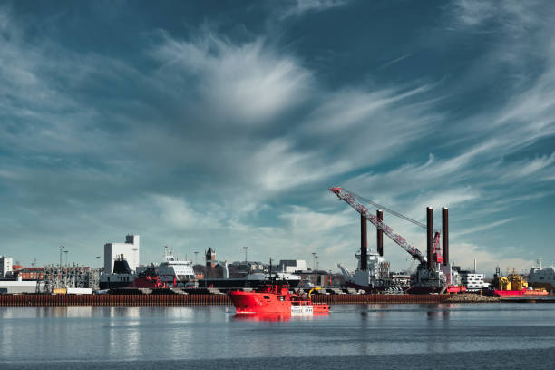 istock Oil and Wind power rigs in Esbjerg harbor. Denmark 1307214493