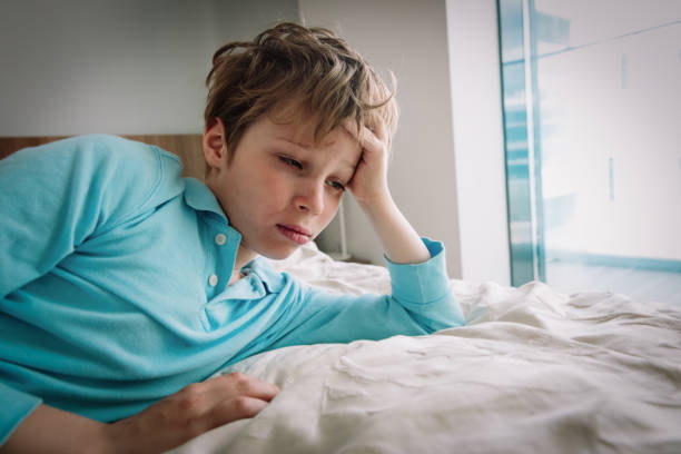 istock kid bored and tired at home, boy stressed and exhausted 1307215861