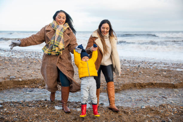 istock Family Visiting the Beach 1307224518