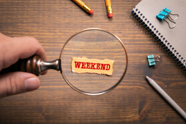 istock Weekend. Working day, fatigue and stress. Magnifying glass in hand 1307225051