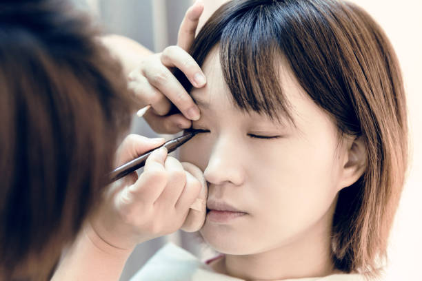 istock the makeup artist made up the bride 1307226611