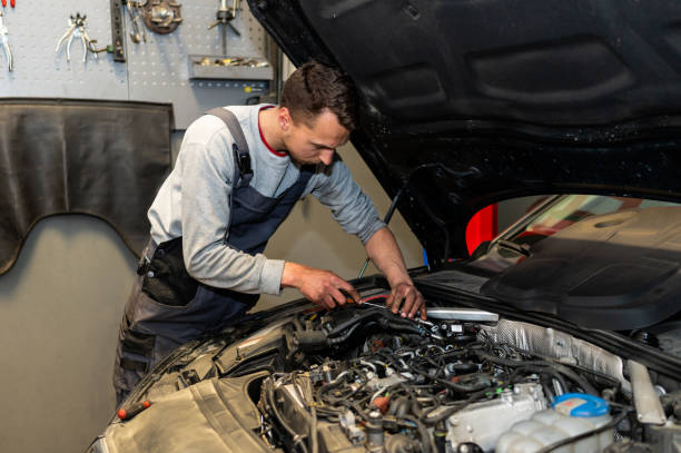 istock Car mechanic doing a service on a vehicle. 1307226807
