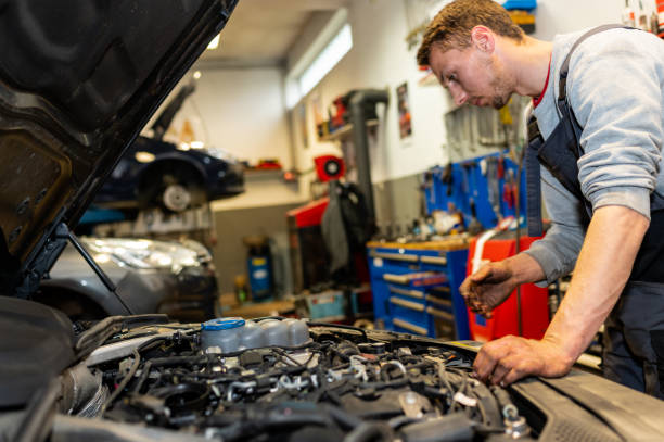 istock Car mechanic doing a service on a vehicle. 1307226813