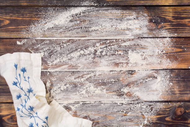 istock Ingredients for making Christmas baked goods: flour, eggs and cookie cutters. Place for text. Background for baking 1307226930