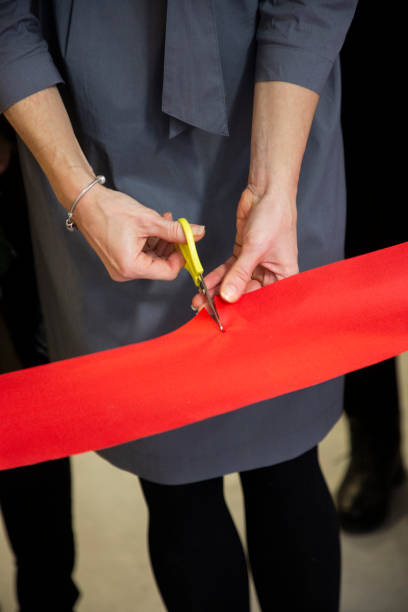 istock Red ribbon cutting during opening ceremony 1307228087