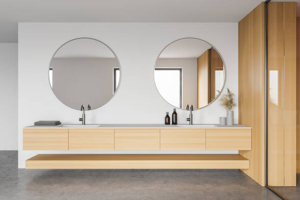 istock White and wooden bathroom interior with double sink 1307229113