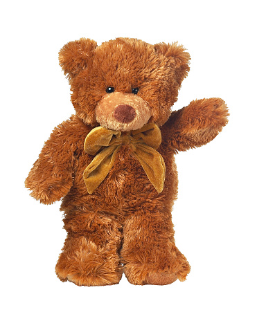 brown colored teddy bear greets with one arm raised, isolated on white background