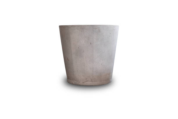 istock Bare concrete round base plant pot on white background. 1307230861