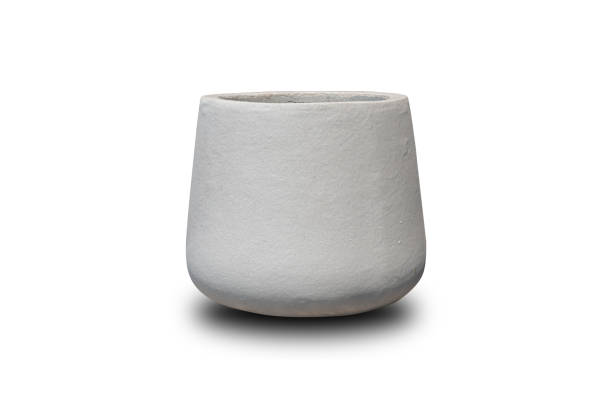 istock Bare concrete round base plant pot on white background. 1307230865