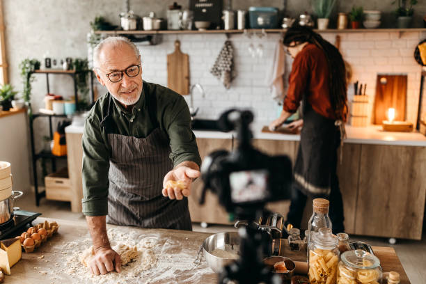 istock Senior chief giving online classes about pasta making 1307231240