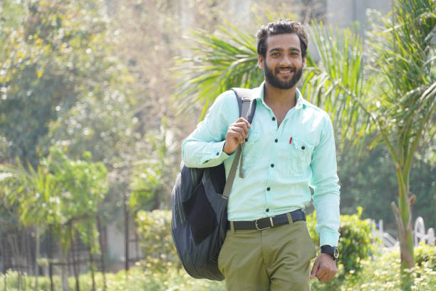 istock college student with his bag and books at his campus 1307231277
