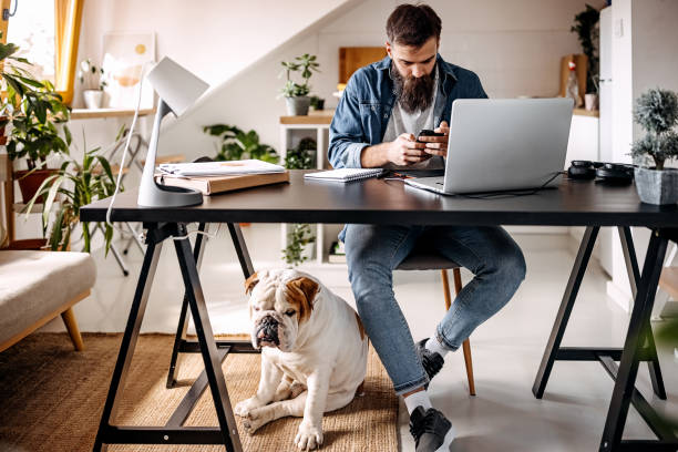 istock Busy Young Freelancer at home office 1307235463