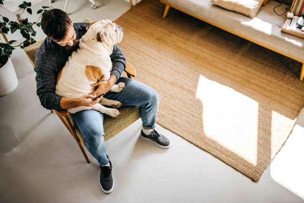 istock Man spending a lazy afternoon with his dog 1307238065