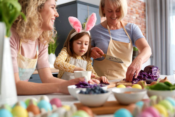 istock Women preparing natural dyes to dye Easter eggs 1307238109