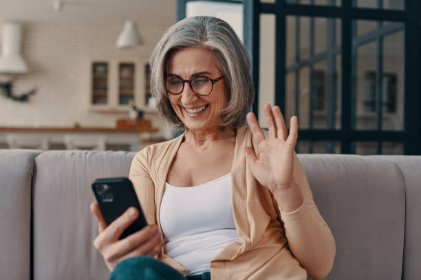 istock Happy senior woman in casual clothing 1307241663