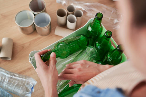istock High angle view of glass bottles in the bin 1307242547