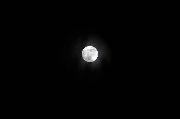 istock shining moon, celestial body and earth satellite in space 1307243865