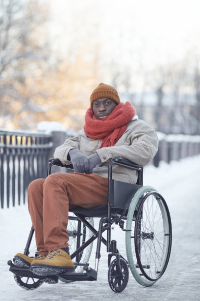 istock Disabled African American Man Outdoors in Winter 1307244406