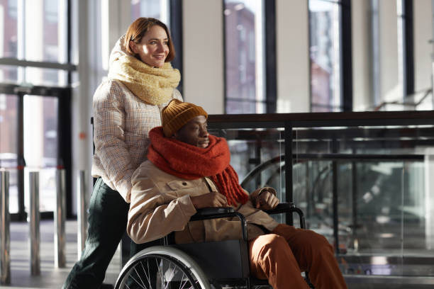 istock Interabled Couple Entering Underground Station 1307244408