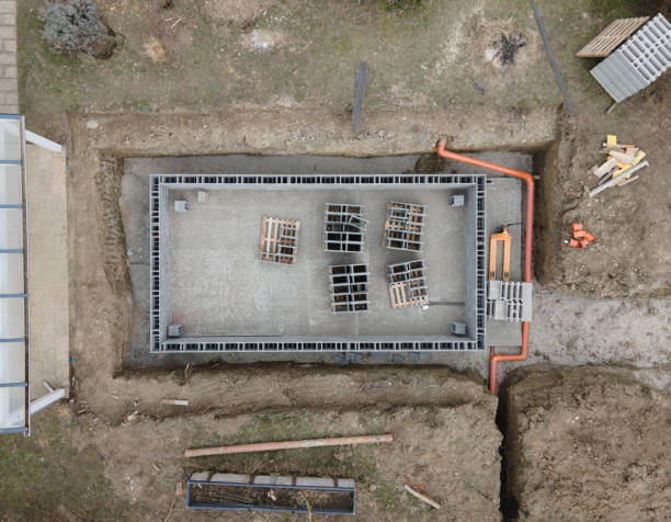 istock Drones aerial photo of a construction site for a pool, concrete blocks already coated and bricked up with construction adhesive