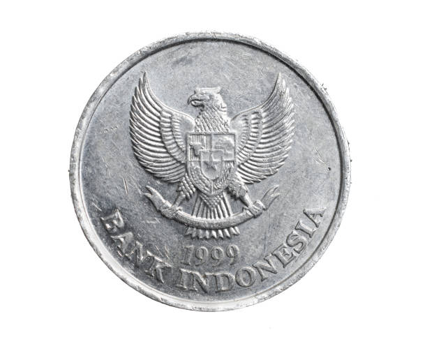 istock Indonesia one hundred rupees coin on a white isolated background 1307248045
