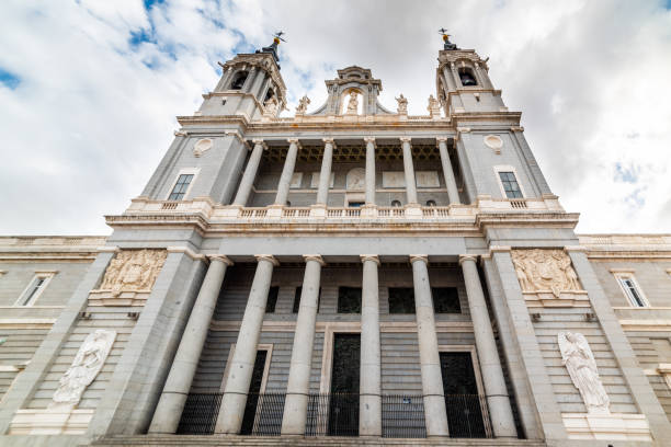 istock Front view of Almudena cathedral under a cloudy sky. 1307248326
