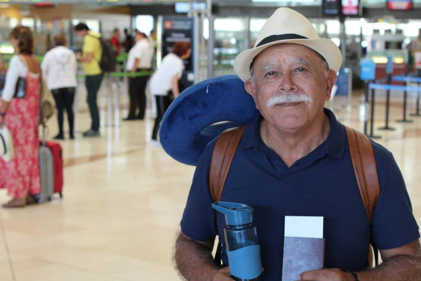 istock Hispanic senior man ready for a vacation 1307249737