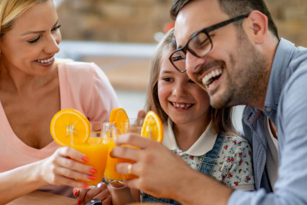 istock Happy family in kitchen 1307249754